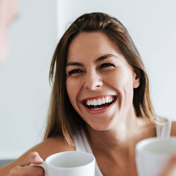 woman smiling and laughing